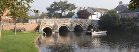 15th Century Town Bridge in Christchurch, Dorset - DRIVEU Minibus Hire